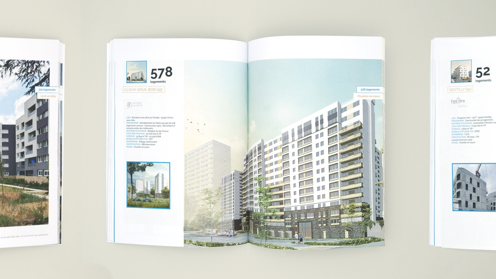 Vue zoomée sur le book projets d’AEC Architecture, ouvert sur une double page intérieure. On peut voir un projet de logements à Clichy-sous-Bois.