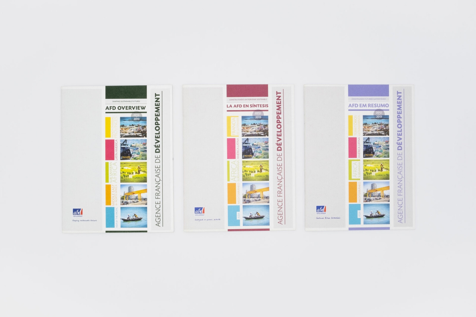 Photo de 3 couvertures de Rapport Annuel d'activité réalisé par Noise en 3 langues.